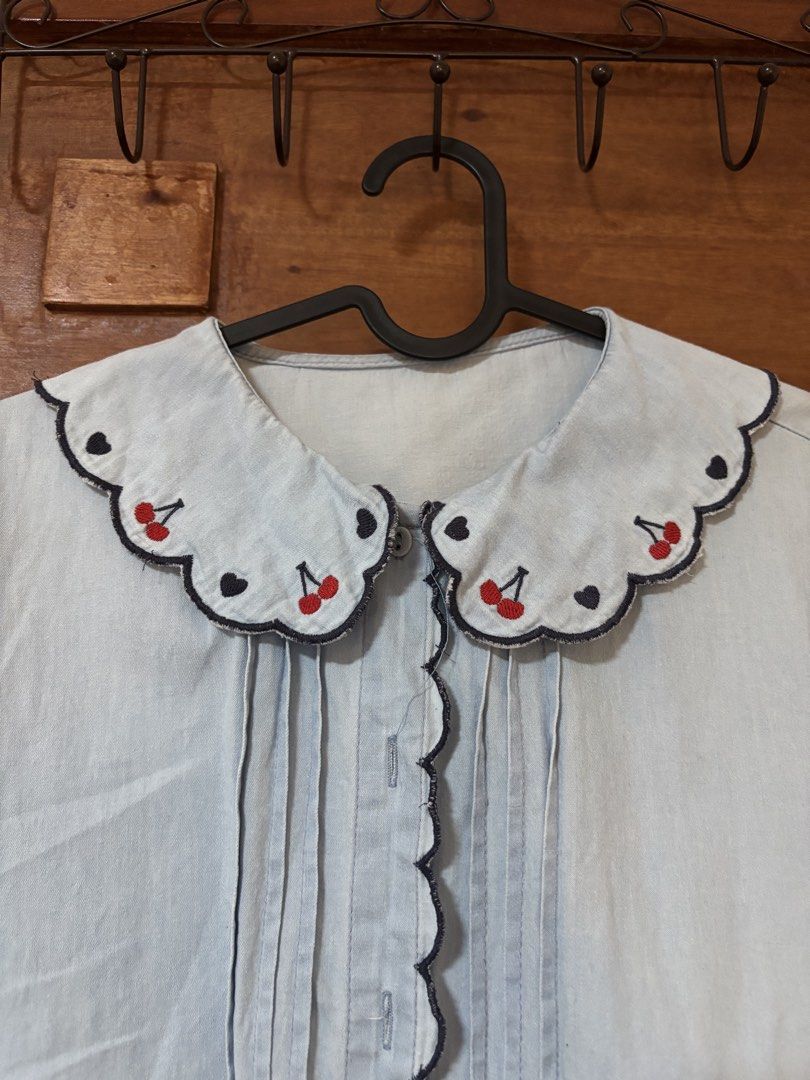 Scallop Collar Blouse (Category: Blouses) located in Trece Martires City. Submitted by decluttercloset_niks (Listing ID 1460300331, Image 2). Description: •thrifted • the stain was there when I thrifted it •initially bought it for laufey concert but didn't end up wearing it.