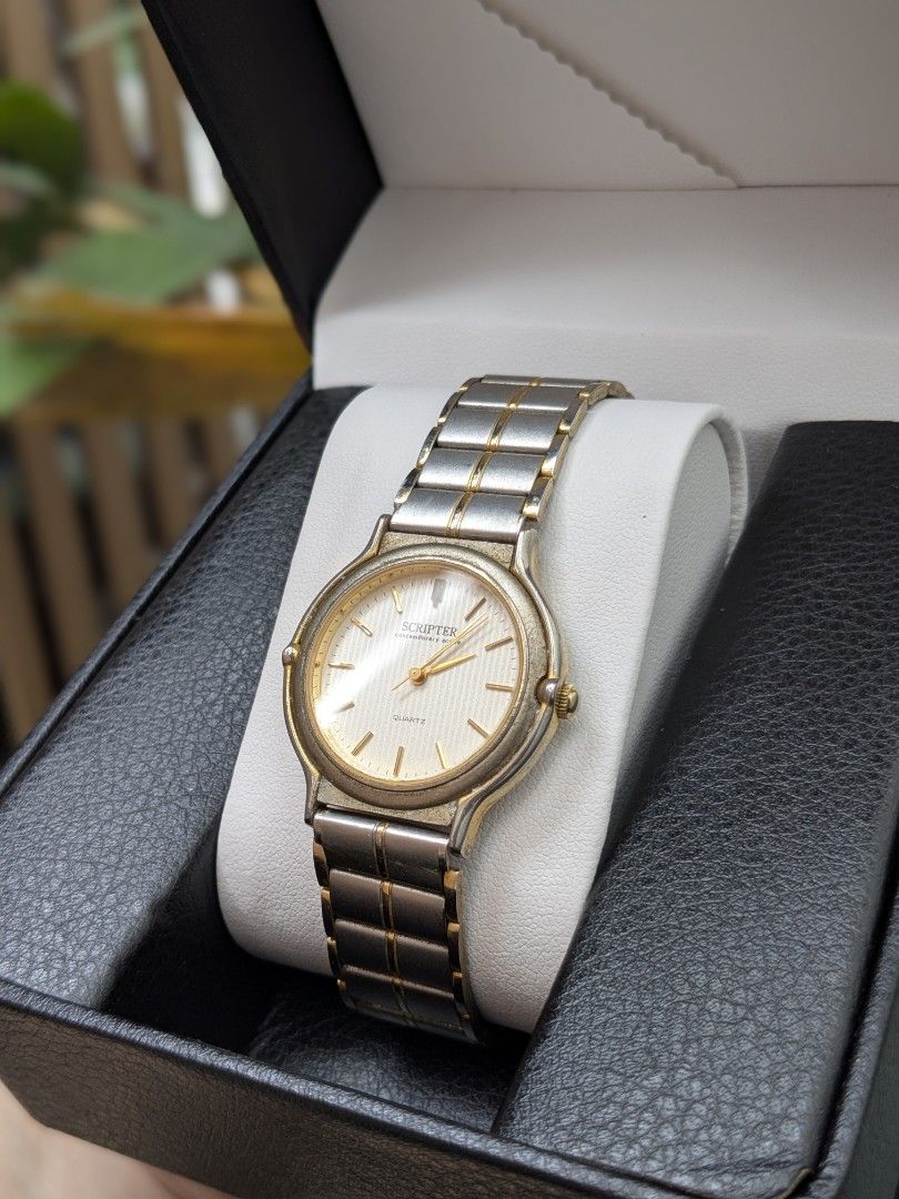 Scripter by J Axis Two Tone Watch (Category: Women's Watches) located in Quezon City. Submitted by nnncorner (Listing ID 1460154036, Image 2). Description: Original Scripter by J-Axis Two Tone Vintage Watch 100% Original 20 peso coin size dial Fits 17-22 cm wrist (adjustable) no scratches or hairlines on glass face still in good condition Japan Movement all original parts it comes with a replacement box only selling it for 2,350.
