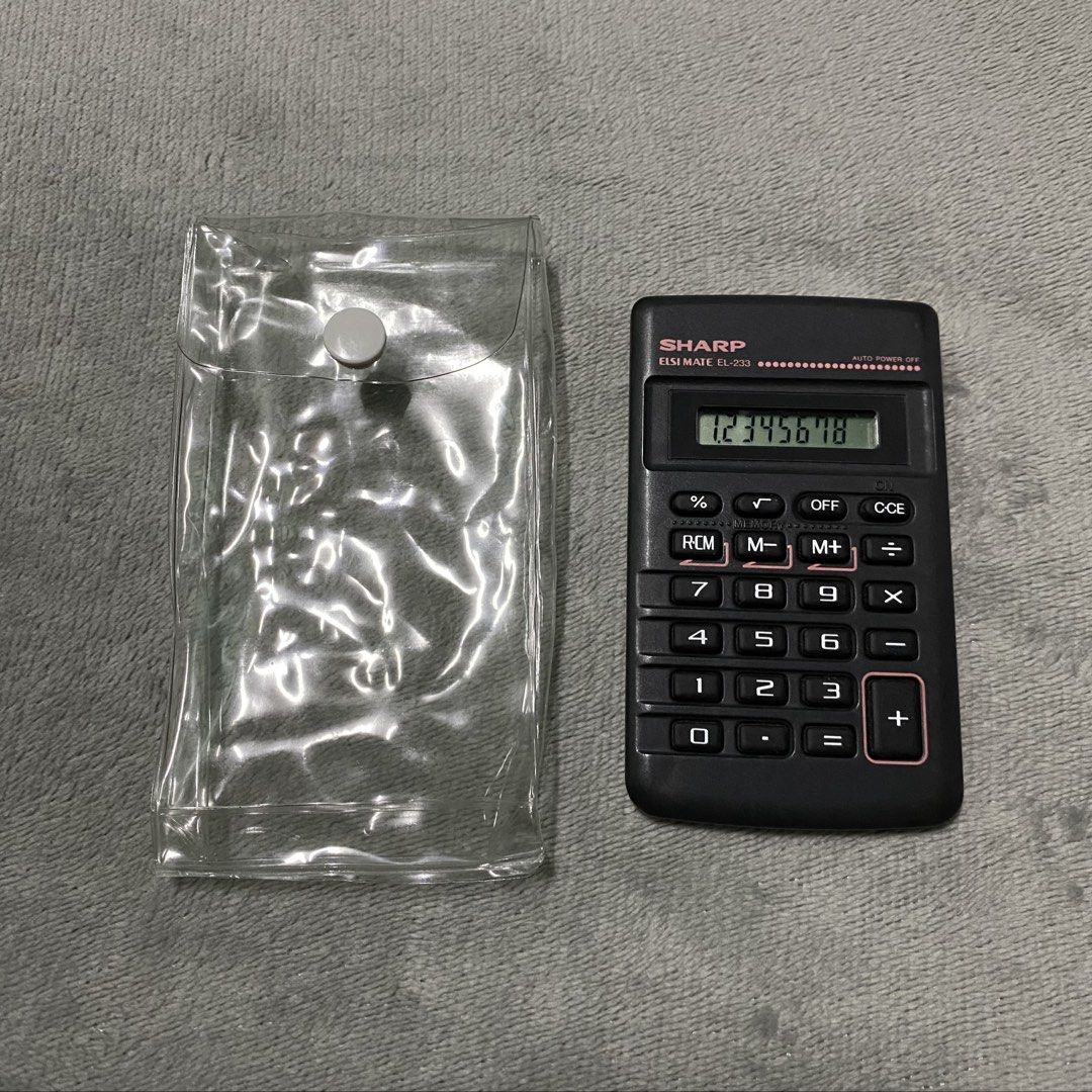 Sharp ELSI MATE EL-233 Compact Calculator |Small | Working | Casio | Japan Surplus | Anik Anik (Category: Office & Business Technology) located in Manila. Submitted by zarsak (Listing ID 1460280039, Image 1). Description: - Sharp ELSI MATE calculator - Model: EL-233 - Basic functions for everyday use - Includes memory functions - Auto power off feature - In good working condition - Ideal for school or office tasks.