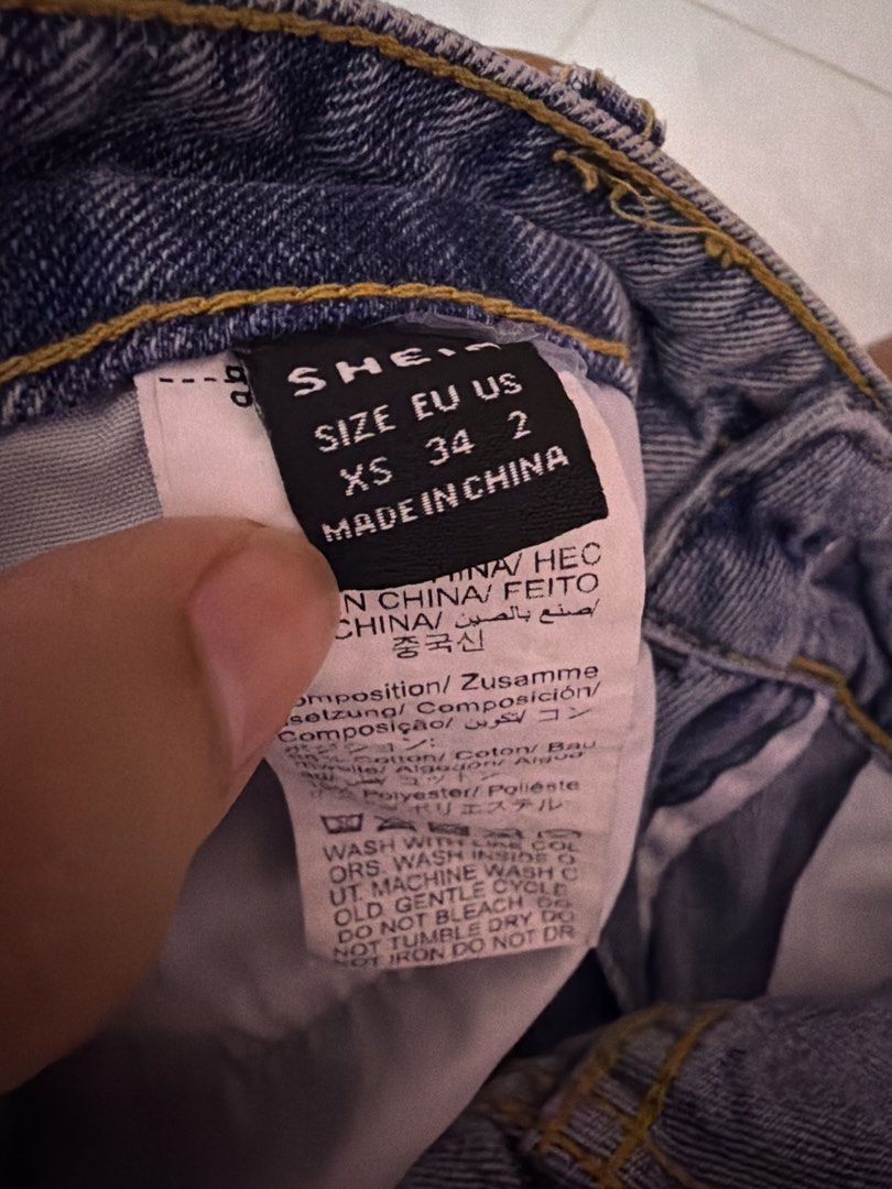 SHEIN Blue Denim High Waisted Cuffed Shorts (Category: Shorts) located in Iligan City. Submitted by my.preloved29 (Listing ID 1460274897, Image 2). Description: - SHEIN blue denim shorts - High-waisted style - Cuffed hems - Button and zip closure - Two front pockets - Ideal for casual wear.