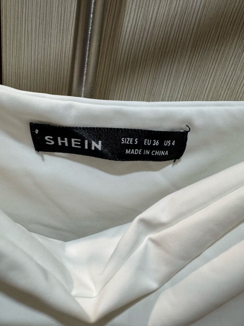 SHEIN White Spaghetti Strap Bodysuit (Size S) (Category: Sleeveless) located in Quezon City. Submitted by anne.declutter (Listing ID 1460165317, Image 2). Description: SHEIN White Spaghetti Strap Bodysuit (Size S) Never used RFS - decluttering MOP - GCash (payment first) Shipping fee shouldered by buyer Location - Quezon City.