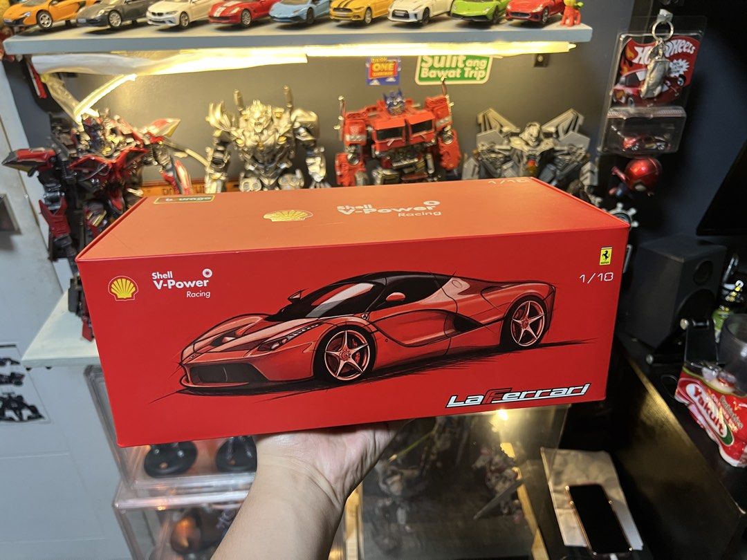 Shell V-Power Racing LaFerrari 1/10 Scale Diecast Model (Category: Vehicle & Diecast Models) located in Manila. Submitted by thegreyhousemarket (Listing ID 1460294762, Image 1). Description: - Shell V-Power Racing LaFerrari Model - Scale: 1/10 Diecast - Original red box with car illustration included - Ideal for car collectors - A piece of automotive art.