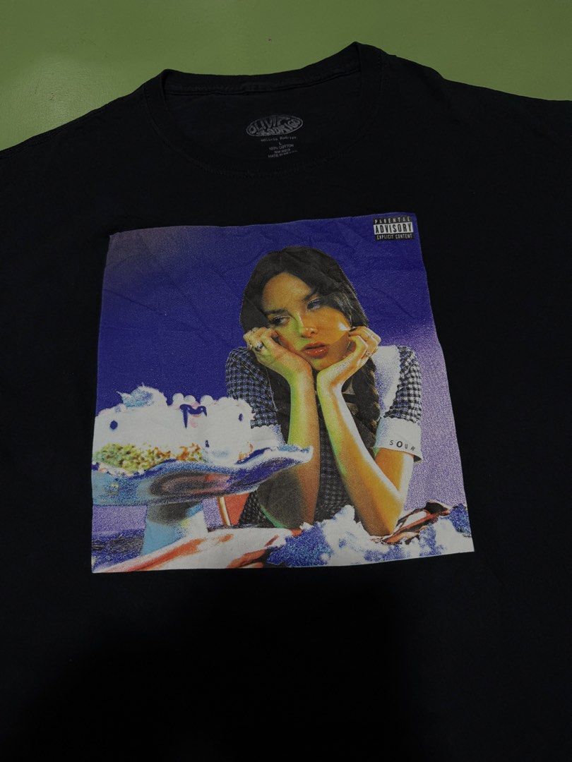 Shirt (Category: Tshirts & Polo Shirts ) located in Pasig City. Submitted by reyeslarry11740 (Listing ID 1460182593, Image 3). Description: For Sale Olivia Rodrigo Sour Graphic Shirt Men Size Large 21.5w x 29.5L Excellent to as new condition No issue 1500 plus ship only Payment 1st Pasig city.