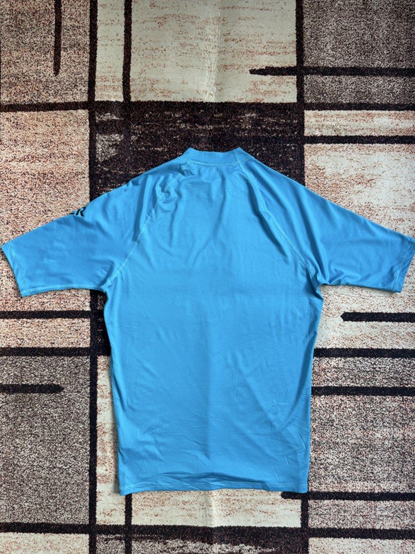 short-sleeve Quiksilver rash guard (Category: Swim Top & Rash Guards) located in Abulug. Submitted by jv1122 (Listing ID 1460193117, Image 2). Description: short-sleeve Quiksilver rash guard no major flaws 20x29 dimes.