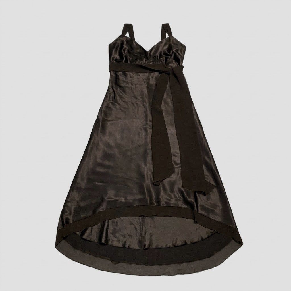 Silk Brown Formal Dress with Tie (Category: Dresses) located in Pilar. Submitted by pey_04 (Listing ID 1460226623, Image 2). Description: - Deep brown silk dress - Flattering V-neckline - Can fit up 32- 34A bust -Length is 44 inches - Cinched waist with matching fabric tie - Asymmetrical hemline - Sheer overlay detail - dress for formal events or a night out.