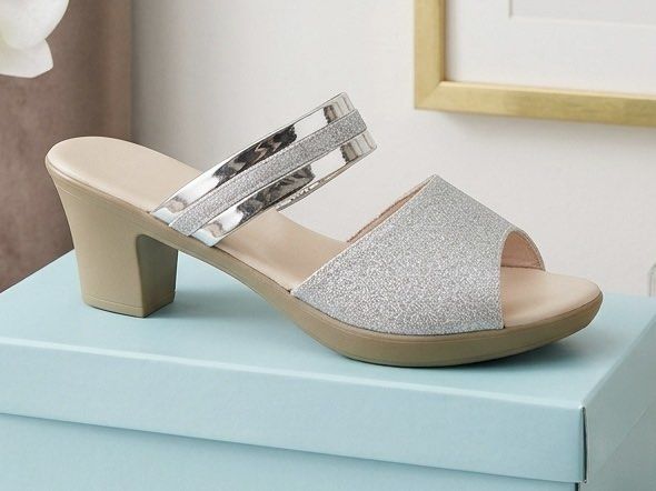 Silver Glitter Block Heel Mules Sandals (Category: Heels) located in Abucay. Submitted by luckyfox_1f1ab5 (Listing ID 1460112046, Image 2). Description: - Sparkly silver glitter mules - Open toe design - Comfortable block heel - Easy slip-on style - Straps with a metallic sheen - Ideal for dressing up outfits Size US 9.5 Used only once. Decluttering..