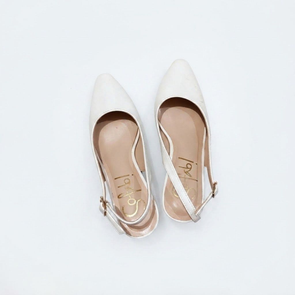 So Fab White Slingback Heels with Buckle Strap (Category: Heels) located in Manila. Submitted by daintywears (Listing ID 1460208899, Image 1). Description: NEEDS CLEANING BUT GOOD CONDITION - Elegant white slingback heels - Stylish pointed toe design - Secure ankle strap with buckle closure - Unique and sturdy block heel - Versatile for various occasions - Please check photos for detailed condition.
