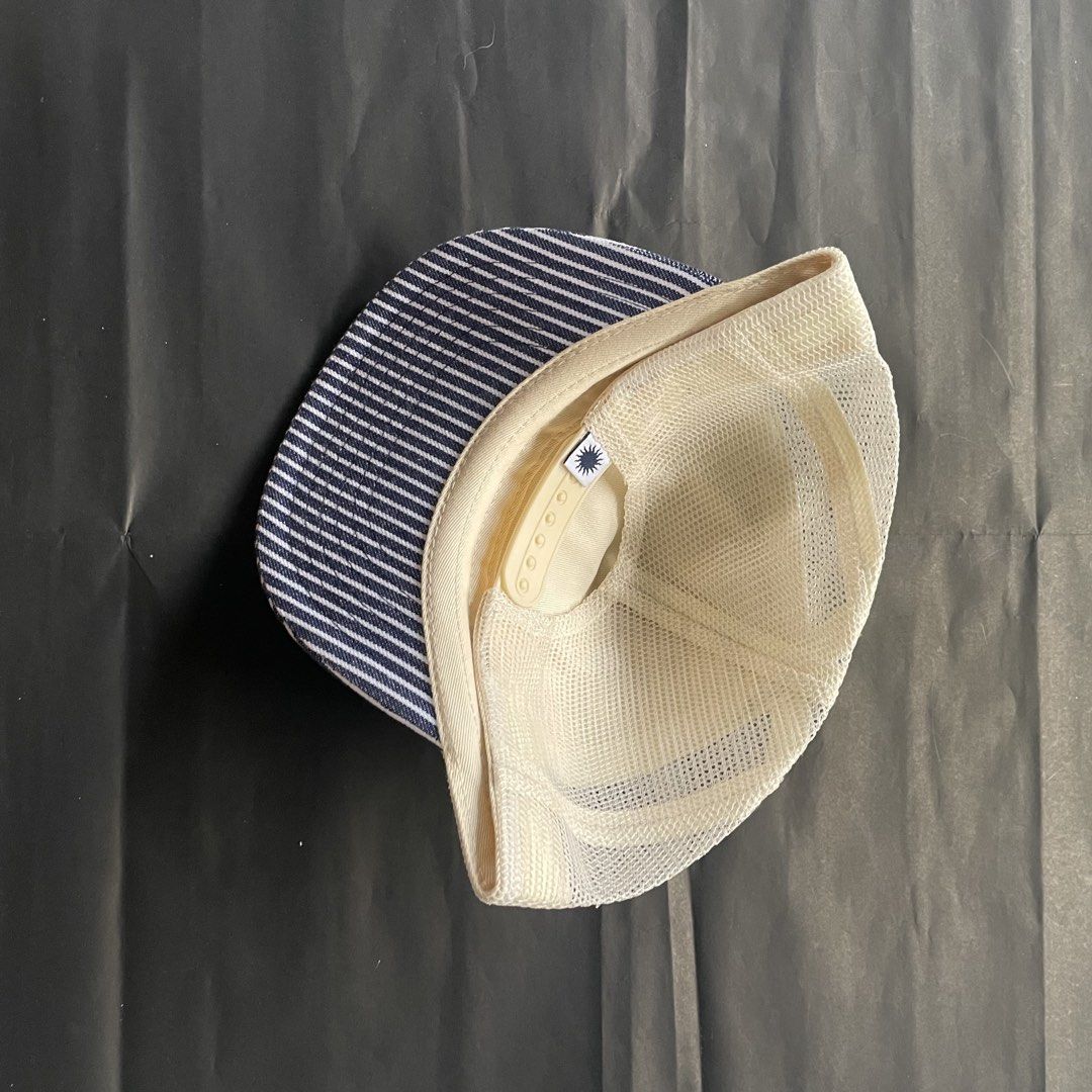 Someday Fabrications Hickory Trucker (Category: Caps & Hats) located in Manila. Submitted by sydge_ (Listing ID 1460172836, Image 2). Description: - Blue and white striped trucker hat - Features a 'Someday' patch with a bunny graphic - Mesh back for excellent breathability - Adjustable strap for a custom fit - Ideal for everyday casual wear.