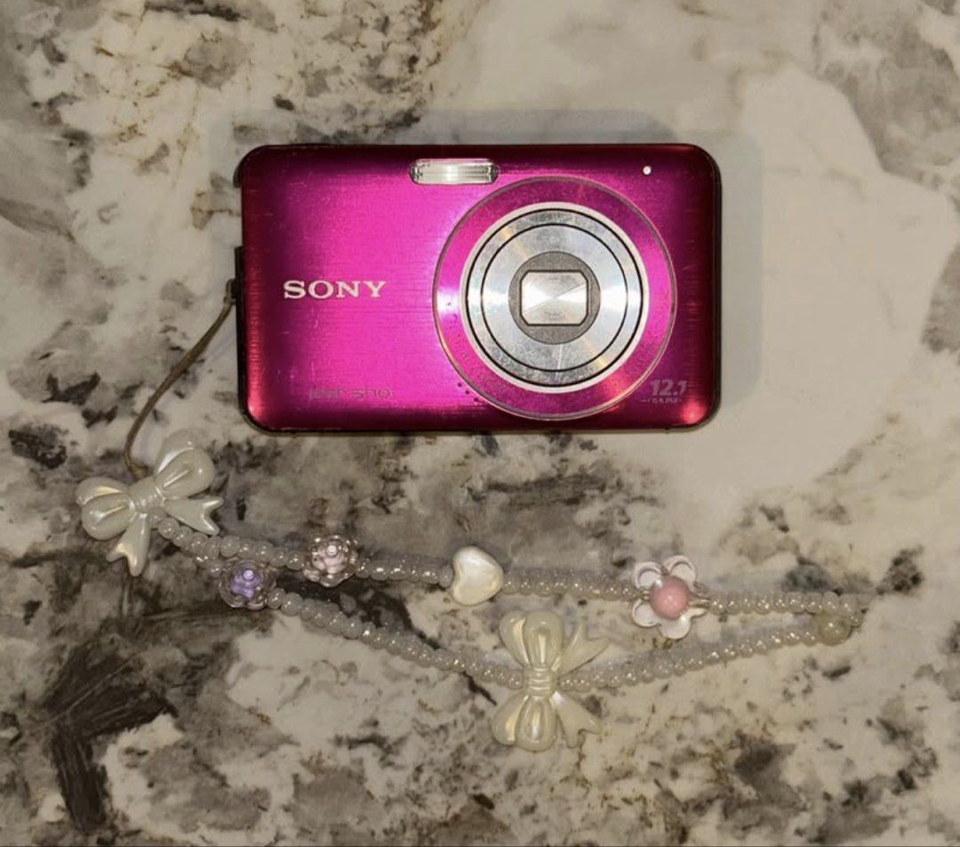 Sony Cybershot - DSC W310 (Pink) (Category: Cameras) located in Quezon City. Submitted by lans0606 (Listing ID 1460294052, Image 1). Description: Sony Cybershot - DSC W310 (Pink) Specs 12.1 MP 4x Optical Zoom Flash and zoom are working condition: 9/10 (scratches, signs of usage) Inclusions: unit itself Case Price: ₱6,500 (Slightly negotiable basta sure buyer) Mode of Delivery: Lalamove Mode of Payment: Gcash QC LOC! Pm for more details!.