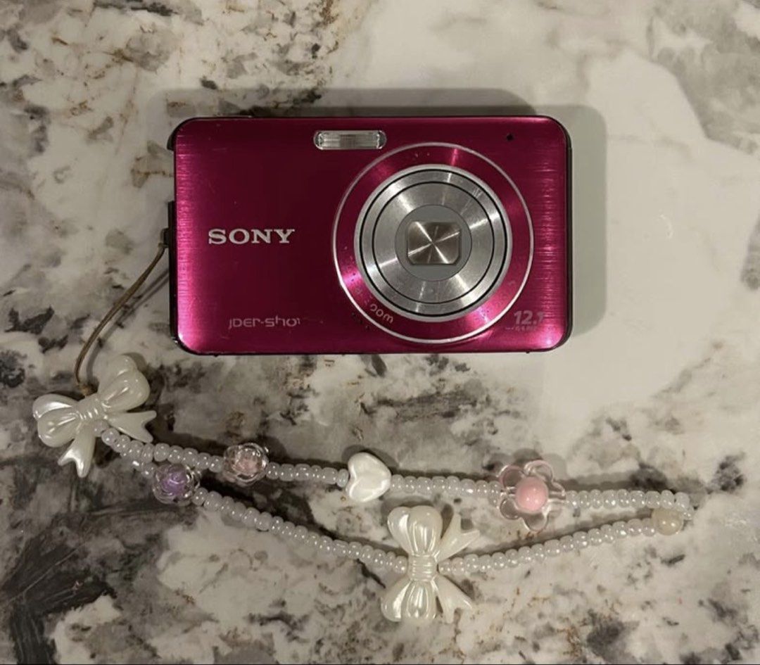 Sony Cybershot - DSC W310 (Pink) (Category: Cameras) located in Quezon City. Submitted by lans0606 (Listing ID 1460294052, Image 2). Description: Sony Cybershot - DSC W310 (Pink) Specs 12.1 MP 4x Optical Zoom Flash and zoom are working condition: 9/10 (scratches, signs of usage) Inclusions: unit itself Case Price: ₱6,500 (Slightly negotiable basta sure buyer) Mode of Delivery: Lalamove Mode of Payment: Gcash QC LOC! Pm for more details!.