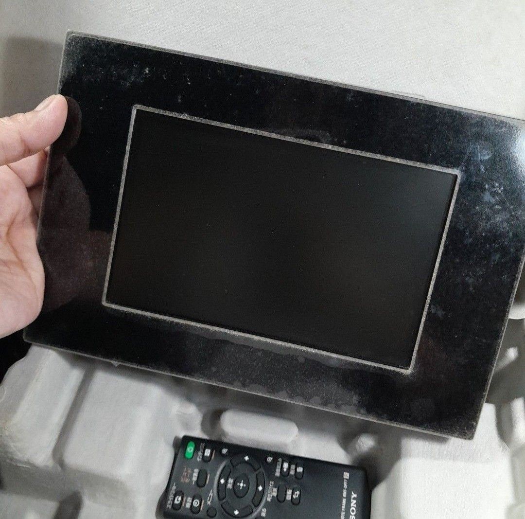 SONY Digital Photo Frame DPFA73 (Category: Other Photography Accessories) located in Las Pinas. Submitted by 84vintage (Listing ID 1460233362, Image 2). Description: Specifications: LCD Screen Resolution WQVGA 480 x 234 Actual Viewing Area Size 138.5 x 86.6mm LCD Panel Size 7" Aspect Ratio 16:10 Compatible Image Format RAW, SRF, SR2, ARW, BMP 1, 4, 8, 16, 24, 32bit Windows format JPEG DCF Ver2.0, Exif Ver2.21 TIFF Exif Ver. 2.21 Internal Memory A