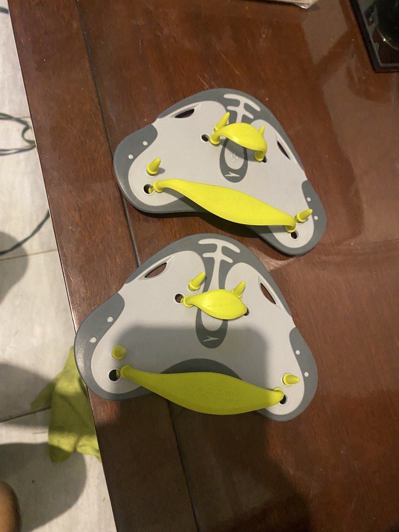 Speedo Swimming Hand Paddles (Category: Water Sports) located in Marikina City. Submitted by jtv17 (Listing ID 1460117120, Image 1). Description: - Speedo hand paddles - Ideal for swim training and stroke improvement - Features yellow straps for a secure fit - Ready for your next swim session.