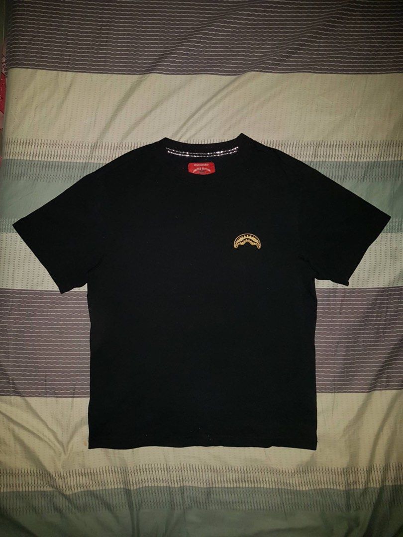 Sprayground Limited Edition Black T-Shirt (Category: Tshirts & Polo Shirts ) located in Bauang. Submitted by drie_02 (Listing ID 1460221248, Image 1). Description: - Iconic Sprayground shark mouth graphic on chest - Limited edition (tag inside) - Small Sprayground logo on back - Perfect for casual outfits.