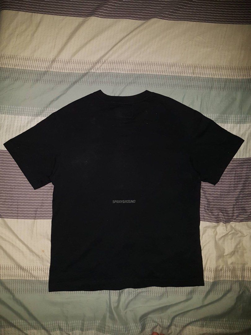Sprayground Limited Edition Black T-Shirt (Category: Tshirts & Polo Shirts ) located in Bauang. Submitted by drie_02 (Listing ID 1460221248, Image 3). Description: - Iconic Sprayground shark mouth graphic on chest - Limited edition (tag inside) - Small Sprayground logo on back - Perfect for casual outfits.