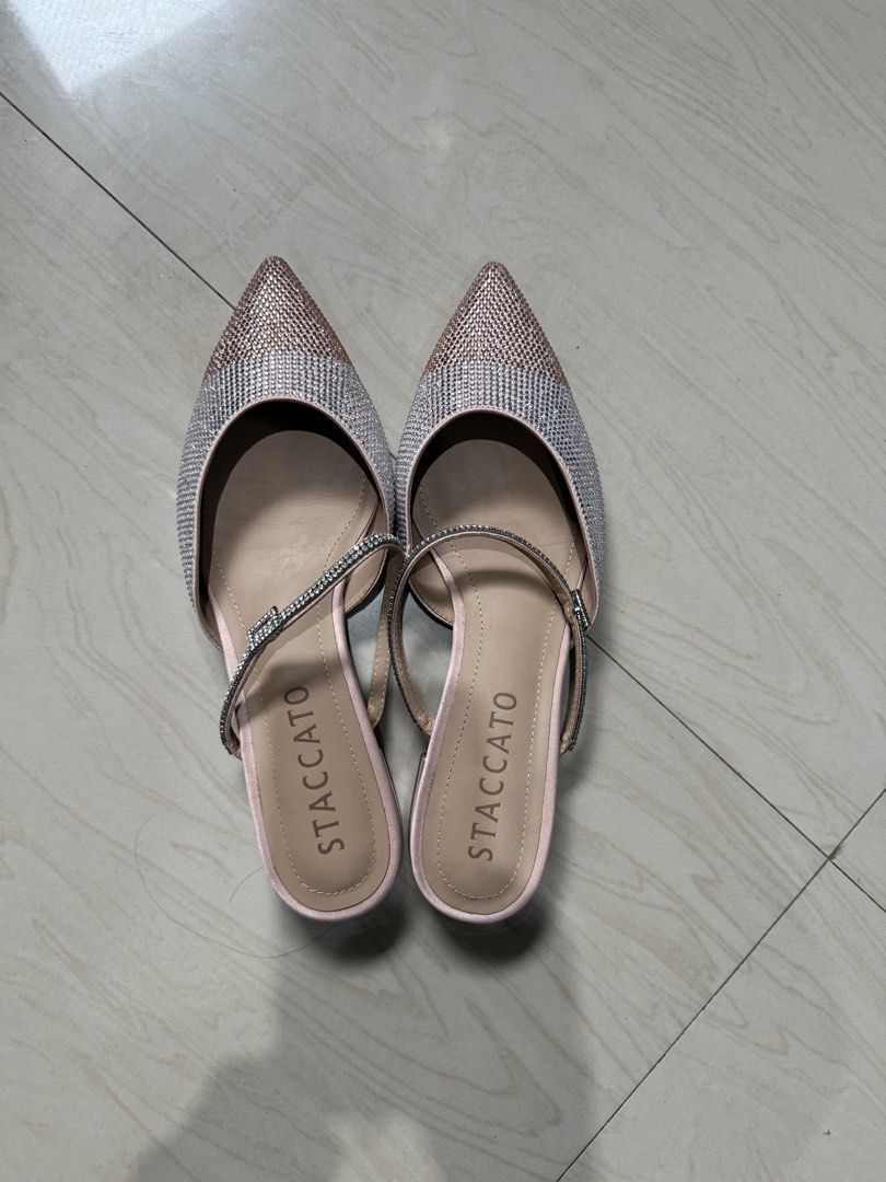 Staccato Embellished Pointed Toe Mules Heels (Category: Heels) located in Makati City. Submitted by francine04 (Listing ID 1460231227, Image 2). Description: - Staccato Mules - Sparkly embellishments - Rose gold and silver tones - Pointed toe design - used it once.