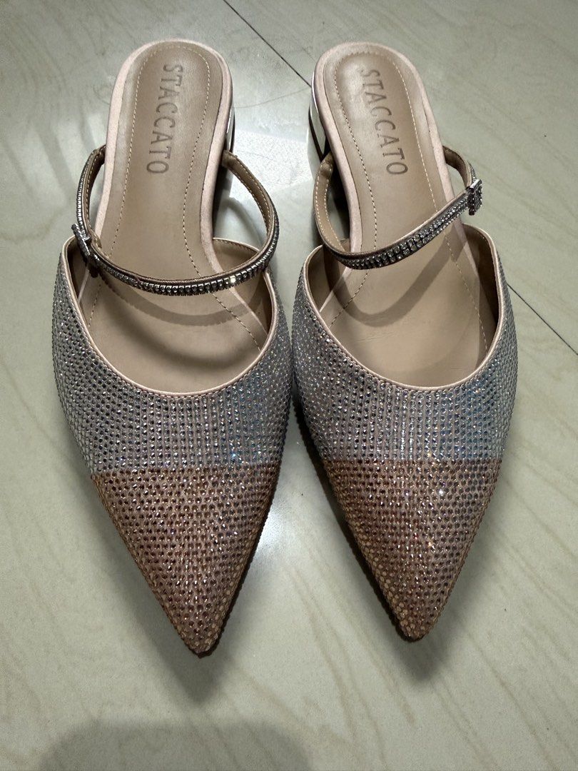 Staccato Embellished Pointed Toe Mules Heels (Category: Heels) located in Makati City. Submitted by francine04 (Listing ID 1460231227, Image 1). Description: - Staccato Mules - Sparkly embellishments - Rose gold and silver tones - Pointed toe design - used it once.