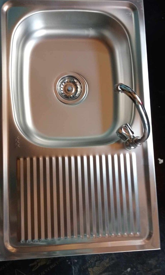 Stainless kitchen sink complete set with drainboard (Category: Bathroom & Kitchen Fixtures) located in Manila. Submitted by muranglababo_ph2026 (Listing ID 1460167803, Image 2). Description: With drainboard complete set Fitting and faucet 17x29 inches 6 inches deep P1500 Location: Binondo Manila Payment; cod or gcash Delivery thru lalamove ☎ 09281643138.