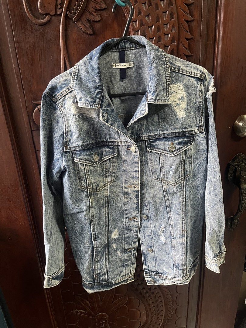 Stradivarius Acid Wash Distressed Denim Jacket (Category: Coats, Jackets and Outerwear) located in Quezon City. Submitted by shopaholics.31 (Listing ID 1460194434, Image 1). Description: - Stradivarius acid wash denim jacket - Distressed look with rips and fading - Button-up front - Two chest pockets - Size M .