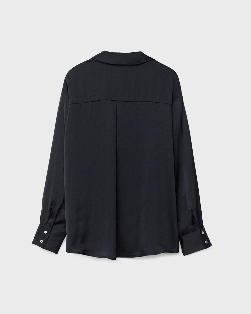 STRADIVARIUS Black Satin Button-Up Shirt (Category: Shirts) located in Cebu City. Submitted by zarizariii___ (Listing ID 1460125709, Image 2). Description: SRP is ₱2k+ and I’m selling it for wayyy cheaper! I barely used it, just a good staple button-up shirt everyone should have in their wardrobe! 📌It’s also kinda big on me, so it can fit S-Semi Med .