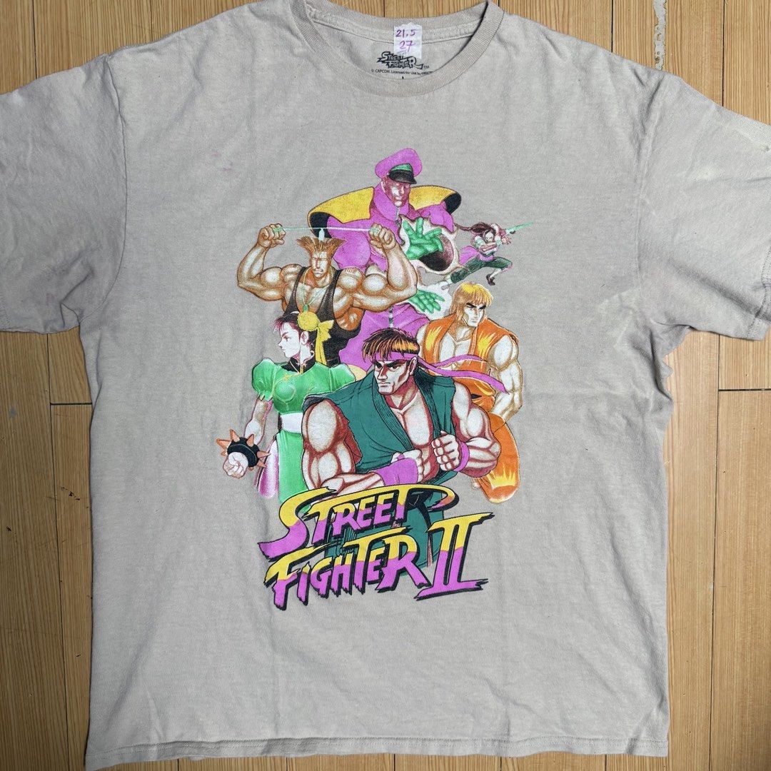street fighter gaming tees (Category: Tshirts & Polo Shirts ) located in Rizal. Submitted by shirtguy78 (Listing ID 1460291864, Image 3). Description: - Vintage Street Fighter II gaming t-shirts - Features iconic characters and game logos - Available in various designs - Perfect for collectors and fans of the game - Rapid sell form available for quick purchase vega 3500 full cast 1k chunli vs blanka 700 chunli aolo 1500.