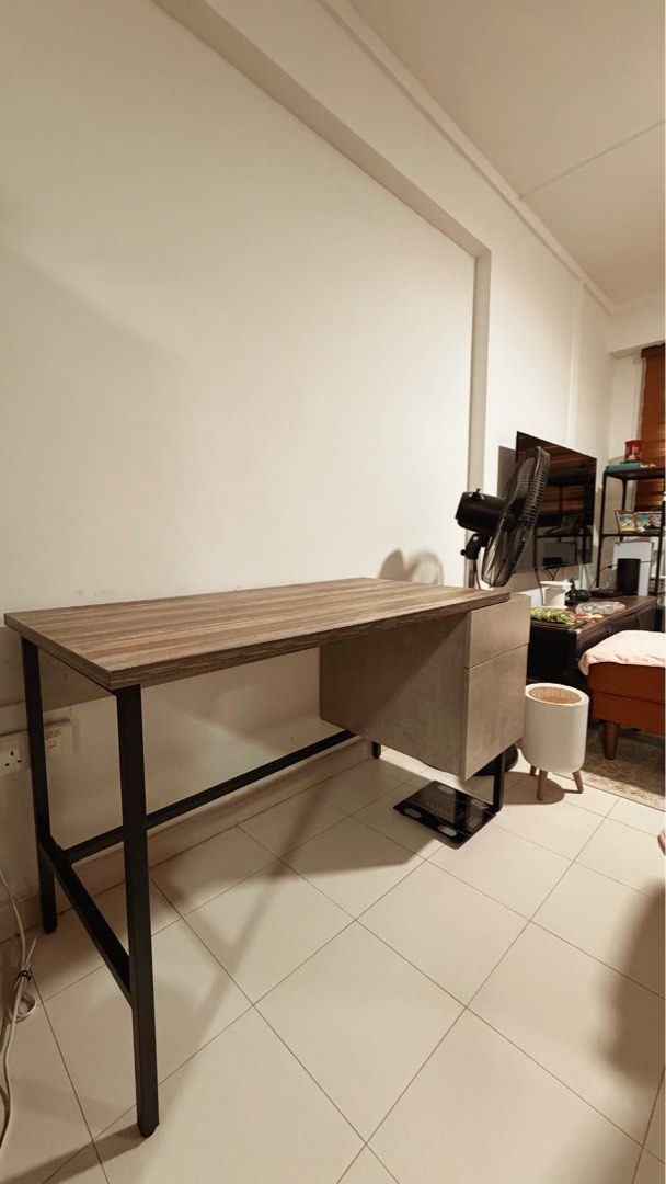 STUDY TABLE (EDISON TABLE) (Category: Tables & Sets) located in Singapore. Submitted by rhnsykr. (Listing ID 1460218489, Image 1). Description: 🖥️ Study Desk with Drawer & Cabinet – Grey Selling a study desk in grey, perfect for home office, study room or bedroom. 📌 Details: • Width: 136.5 cm • Depth: 60 cm • Height: 76.5 cm • Colour: Grey • Comes with drawer storage + cabinet storage • Sturdy steel tube frame 📩 PM if interested. Serious buyer