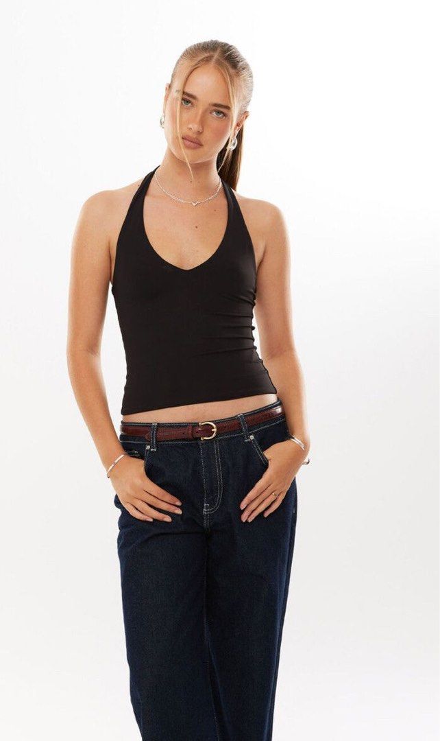 SUPRE Black Halter Top (Category: Sleeveless) located in Angeles City. Submitted by aicl_ (Listing ID 1460131834, Image 1). Description: Perfect going out top Australian brand Brand new with tag.