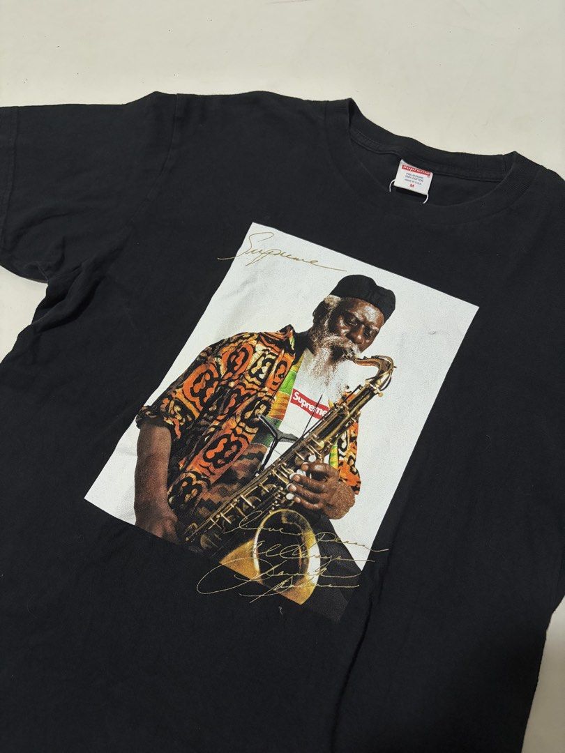 Supreme Pharoah Sanders (Category: Tshirts & Polo Shirts ) located in Manila. Submitted by swaaaaggy (Listing ID 1460197261, Image 2). Description: Supreme Pharoah Sanders Photo Tee Size M (20x27) Good Condition (black mark on graphic) Authentic ₱2,000 .