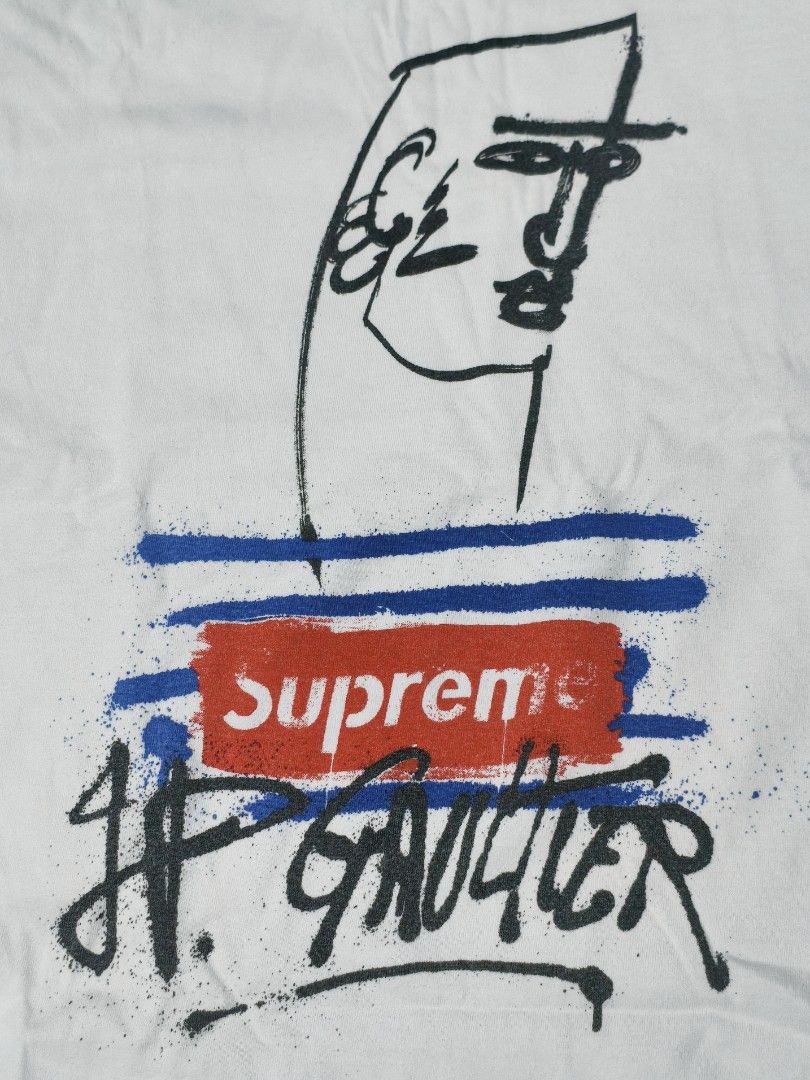 Supreme x Jean Paul Gaultier Tee (Category: Tshirts & Polo Shirts ) located in Davao. Submitted by thr1fty_cent (Listing ID 1460304339, Image 3). Description: - Supreme x Jean Paul Gaultier Tee - Iconic Graphic Print - 100% Premium Cotton - Pre-shrunk for lasting fit - Size: Medium - Made in USA - Perfect for collectors and streetwear enthusiasts.