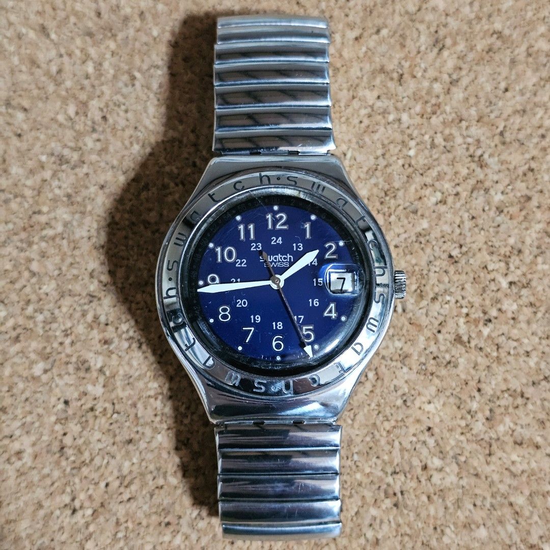 Swatch Irony Happy Joe Blue (Category: Men's Watches) located in Makati City. Submitted by piw.wip (Listing ID 1460167533, Image 2). Description: ⌚ Swatch Irony Happy Joe Blue Condition: Very Good | Working Movement: Quartz Size: 37mm case diameter | Fits up to size 7 wrists Flaws: Light scratches | Internal crack (see last photo) ❗️Please Note: Review all photos carefully as they form part of the description. Signs of use are expected on pre-own