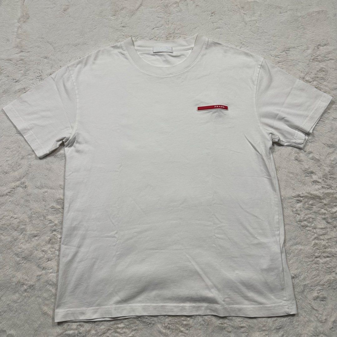 T shirt (Category: Luxury Apparel) located in Baguio. Submitted by denden071016 (Listing ID 1460296981, Image 1). Description: Prada shirt Small.