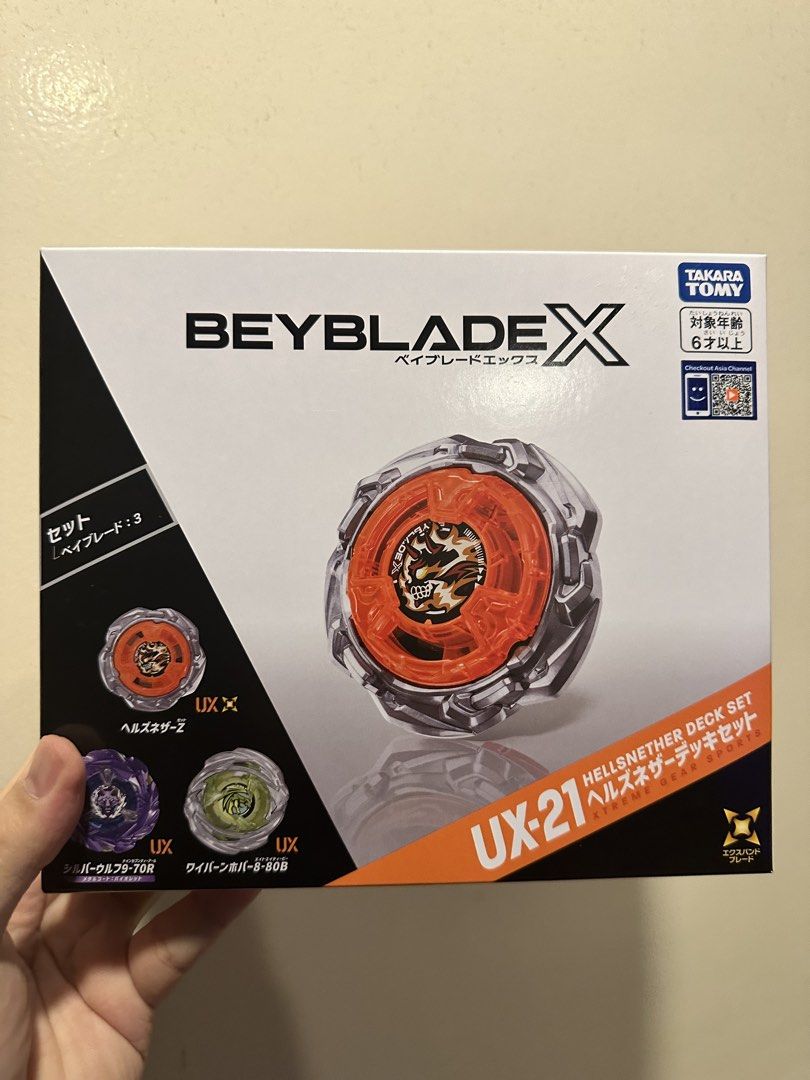 Takara Tomy Beyblade X UX-21 Hellsneather Deck Set (Category: Action & Battle Toys) located in Paranaque City. Submitted by a_cosue (Listing ID 1460170193, Image 1). Description: - Complete Takara Tomy Beyblade X UX-21 Hellsneather Deck Set - Includes Beyblades: Hellsneather, Silverwolf, and Wyvernhoard - Comes with stadium and launcher - Ideal for Beyblade enthusiasts and collectors.