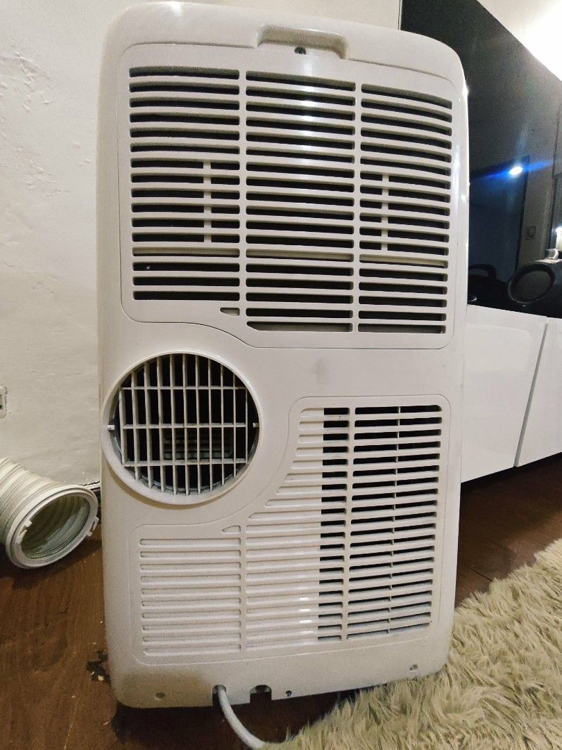 TCL 1.5 hp Portable Air Conditioner with Remote (Category: Air Conditioning and Heating) located in Quezon City. Submitted by lyn.22 (Listing ID 1460125737, Image 3). Description: - TCL 1.5 HP Portable Air Conditioner (Model: TAC-12CPA/W) - Powerful Cooling: 12600 kJ/h capacity - High Airflow: 350 m³/h - Quiet Operation: Only 54 dB(A) noise level - Includes: Remote control and exhaust hose - Easy to Move: Net weight of 29 kg TCL 1.5hp Portable AC