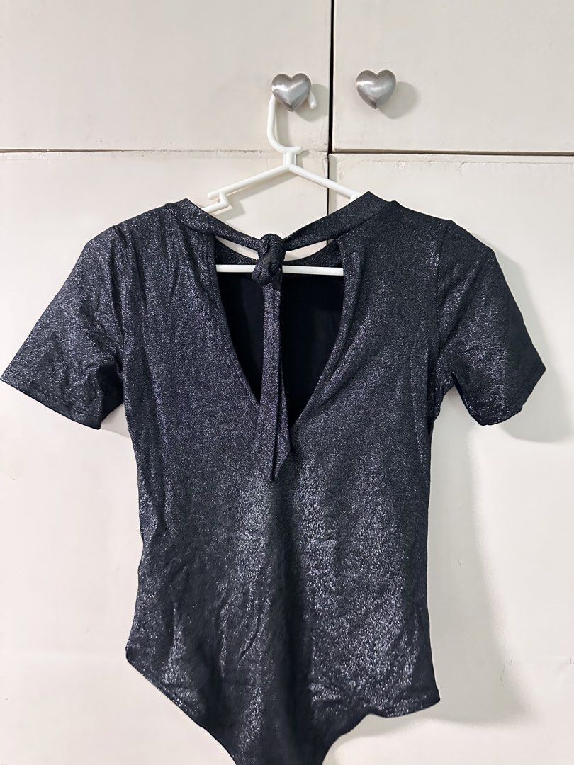 Terranara Black Sparkly Bodysuit XS (Category: Others Tops) located in Quezon City. Submitted by bentabelles (Listing ID 1460257844, Image 2). Description: - Black sparkly bodysuit from Terranara - Short sleeves with tie-back neck detail - Features 'visionary' print on the front - Versatile for layering or wearing alone - Size XS.