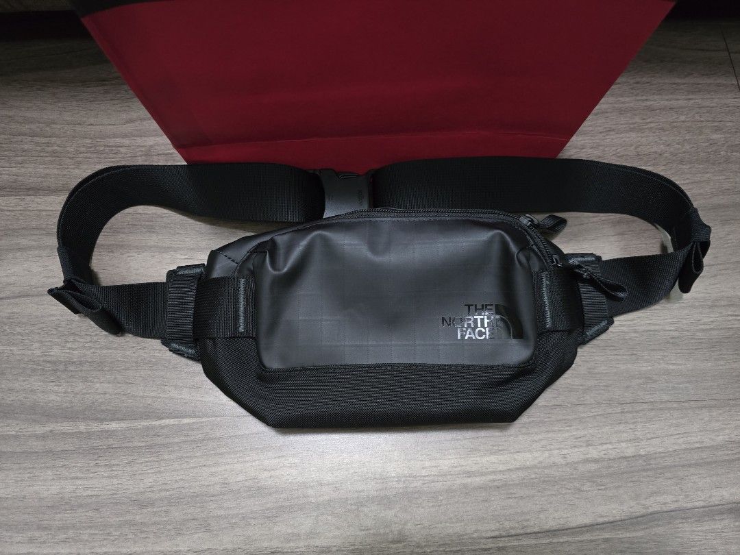 The North Face Black Sling (Category: Belt bags, Clutches and Pouches) located in Manila. Submitted by ddc77 (Listing ID 1460203262, Image 2). Description: Used once, 10/10 condition Bought 3.5k Comes with paperbag and original tags, etc .