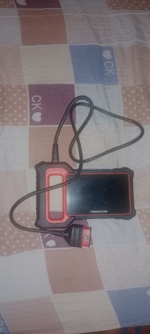 THINKCAR OBD2 Car Diagnostic Scanner Tool (Category: Other Automotive Parts and Accessories) located in Las Pinas. Submitted by mikedee_8888 (Listing ID 1460275277, Image 2). Description: - THINKCAR OBD2 Scanner - Reads and clears engine trouble codes - Connects directly to your car's OBD-II port - Diagnose and check engine issues - Comes with necessary cable - Tested and confirmed working 3,500.