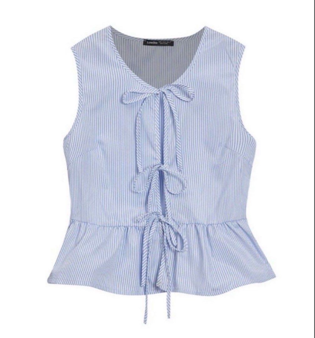 Tie-Front Peplum Top | Blue Striped (Category: Others Tops) located in Rizal. Submitted by gracefullykept (Listing ID 1460192526, Image 1). Description: - Item: Sleeveless, V-neck, triple front bow/ribbon ties, peplum hem - Size: S-M - Vibe: Coquette, Cottagecore, Y2K, Summer Casual 🚛 MOD: J&T / Lalamove 💰 MOP: GCash 💌 Send a direct message for when worn.