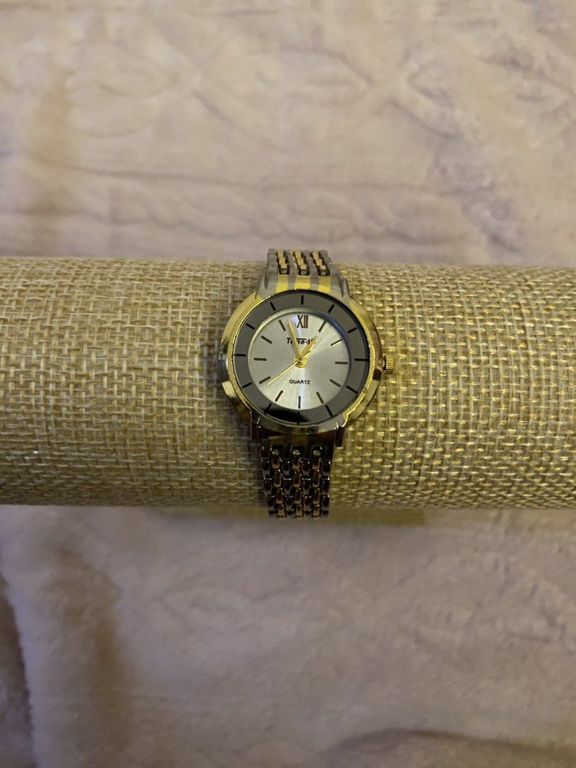 Time 4u watch (Category: Women's Watches) located in San Fernando. Submitted by curatedchic.bybei (Listing ID 1460187176, Image 1). Description: - Brand: Time 4u - Type: Quartz Watch - Dial Color: Silver with Roman Numerals - Band Material: Two-tone Metal (Gold & Silver) - Condition: Excellent - Shipping: J&T Express.