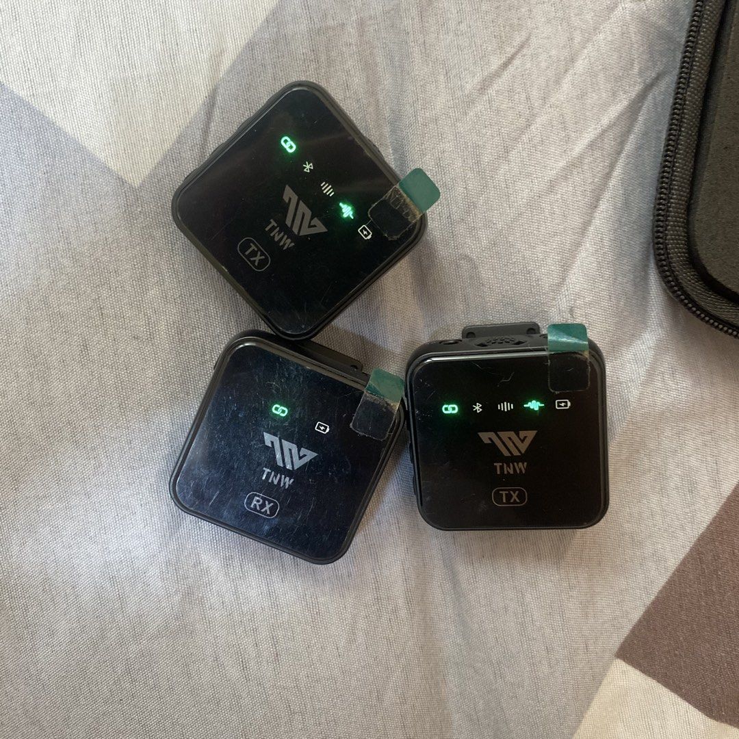 TNW Wireless Lavalier Microphone System with Case (Category: Microphones) located in Cebu City. Submitted by icethebear (Listing ID 1460155766, Image 3). Description: - TNW Wireless Lavalier Microphone System - Includes: 2 Transmitters (TX), 1 Receiver (RX) - Comes with: Charging Case, USB-C Cable, 2 Furry Windscreens - 1 Adapter included for phone connection - Ideal for vlogging and interviews - All items are neatly stored in the charging case -