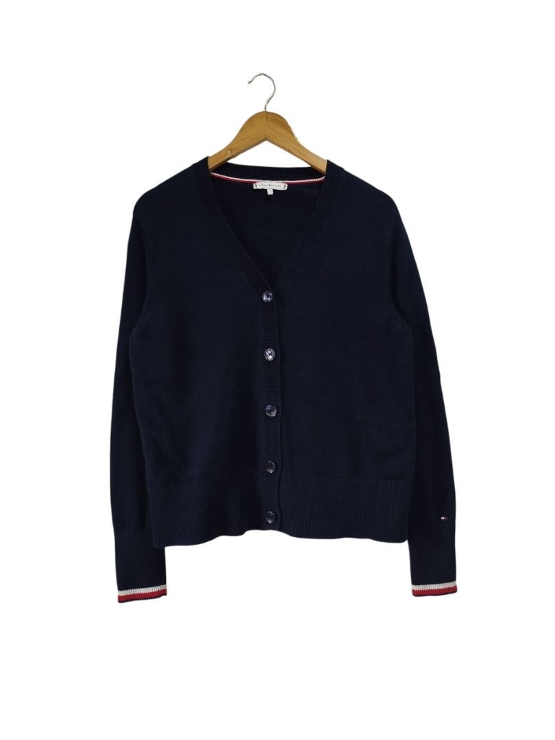 TOMMY HILFIGER KNITTED CARDIGAN (Category: Coats, Jackets and Outerwear) located in Bayombong. Submitted by Gentlemans_ClosEt (Listing ID 1460167985, Image 1). Description: TOMMY HILFIGER KNITTED CARDIGAN SIZE LARGE DIMES: W19 X L25 COLOR: NAVY BLUE 9.5/10 COLOR RATE EXCELLENT CONDITION CUT PORTION OF WASHTAG.