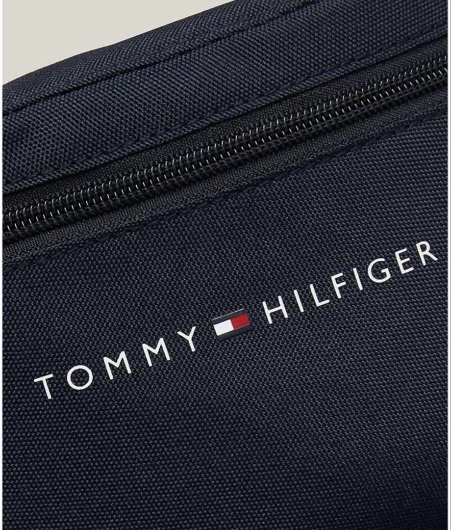 Tommy Hilfiger logo belt bag (Category: Sling Bags) located in Rizal. Submitted by katmandulovesmakeup (Listing ID 1460161967, Image 2). Description: Bnew with tags Navy blue From canada Adjustable Great for running, hiking and errands.
