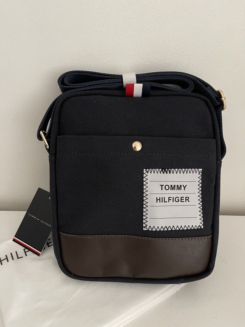 Tommy Hilfiger Sling Bag - Blue (Category: Sling Bags) located in Pasig City. Submitted by preloved.closet2 (Listing ID 1460300845, Image 1). Description: Fixed Price on Hand Sling Bag Size 9 inches Add paperbag plus 80.