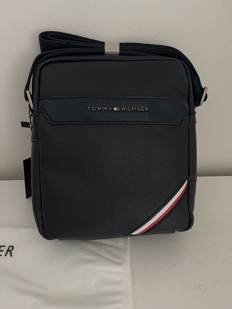 Tommy Hilfiger Sling Bag - Blue / Black (Category: Sling Bags) located in Pasig City. Submitted by preloved.closet2 (Listing ID 1460301162, Image 2). Description: Fixed Price Available in 2 colors Black / Blue Add Paperbag plus 80 .