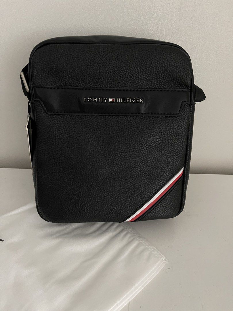 Tommy Hilfiger Sling Bag - Blue / Black (Category: Sling Bags) located in Pasig City. Submitted by preloved.closet2 (Listing ID 1460301162, Image 1). Description: Fixed Price Available in 2 colors Black / Blue Add Paperbag plus 80 .