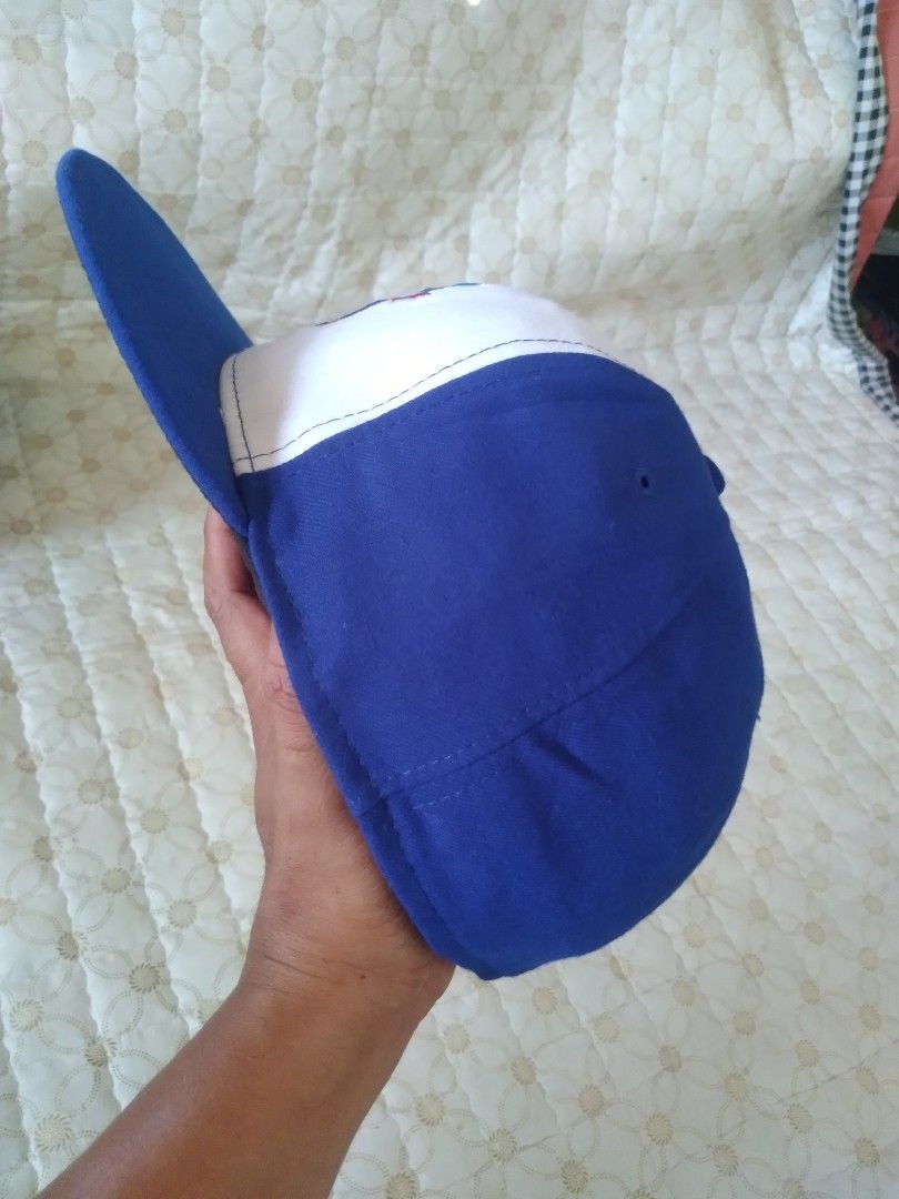Toronto Blue Jays Baseball Cap (Category: Activewear) located in Zamboanga. Submitted by zhumhazhav (Listing ID 1460186346, Image 2). Description: This is a Toronto Blue Jays Baseball Cap, Featuring a white front panel with the classic blue Jay and red maple leaf logo and a royal blue brim. Size 7 5/8 60.6 cm Excellent condition Color rate 10/10 Presentable,no flaws Check all photos for details 850+shipping fee.