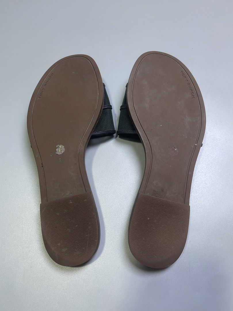 Tory Burch Miller Sandals (Category: Flats & Sandals) located in Zamboanga. Submitted by laffthrift_23 (Listing ID 1460278942, Image 3). Description: - Tory Burch Miller Sandals - Color: Dark Green & Navy Blue - Style: Comfortable Slip-On - Condition: Signs of wear on soles and insoles, but plenty of life remaining. - Ideal for: Casual outings and everyday wear..