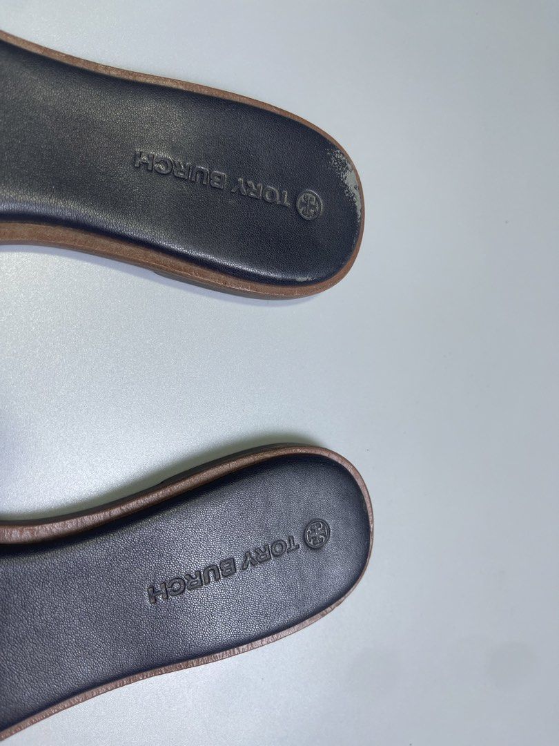 Tory Burch Miller Sandals (Category: Flats & Sandals) located in Zamboanga. Submitted by laffthrift_23 (Listing ID 1460278942, Image 2). Description: - Tory Burch Miller Sandals - Color: Dark Green & Navy Blue - Style: Comfortable Slip-On - Condition: Signs of wear on soles and insoles, but plenty of life remaining. - Ideal for: Casual outings and everyday wear..