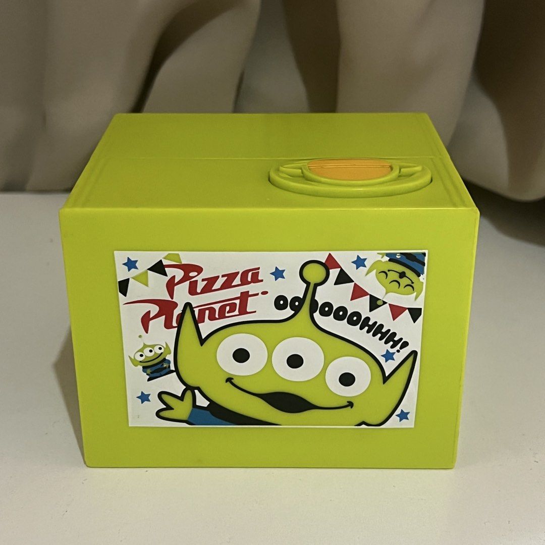 Toy Story Alien Automatic Coin Bank (Category: Interactive Toys) located in Manila. Submitted by nikaniks25 (Listing ID 1460135016, Image 2). Description: Working Walang takip for the coin sa baba No batteries included.