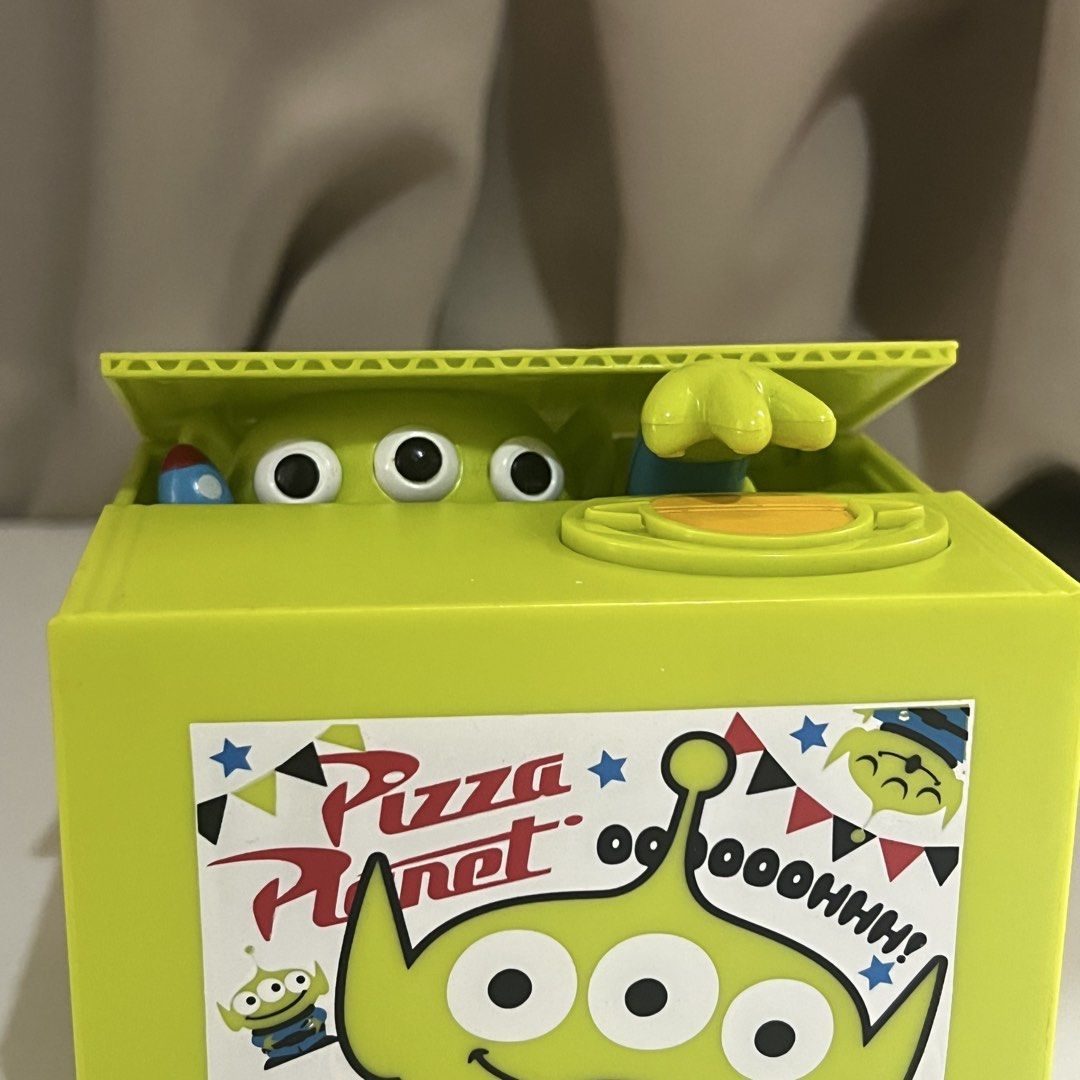 Toy Story Alien Automatic Coin Bank (Category: Interactive Toys) located in Manila. Submitted by nikaniks25 (Listing ID 1460135016, Image 3). Description: Working Walang takip for the coin sa baba No batteries included.