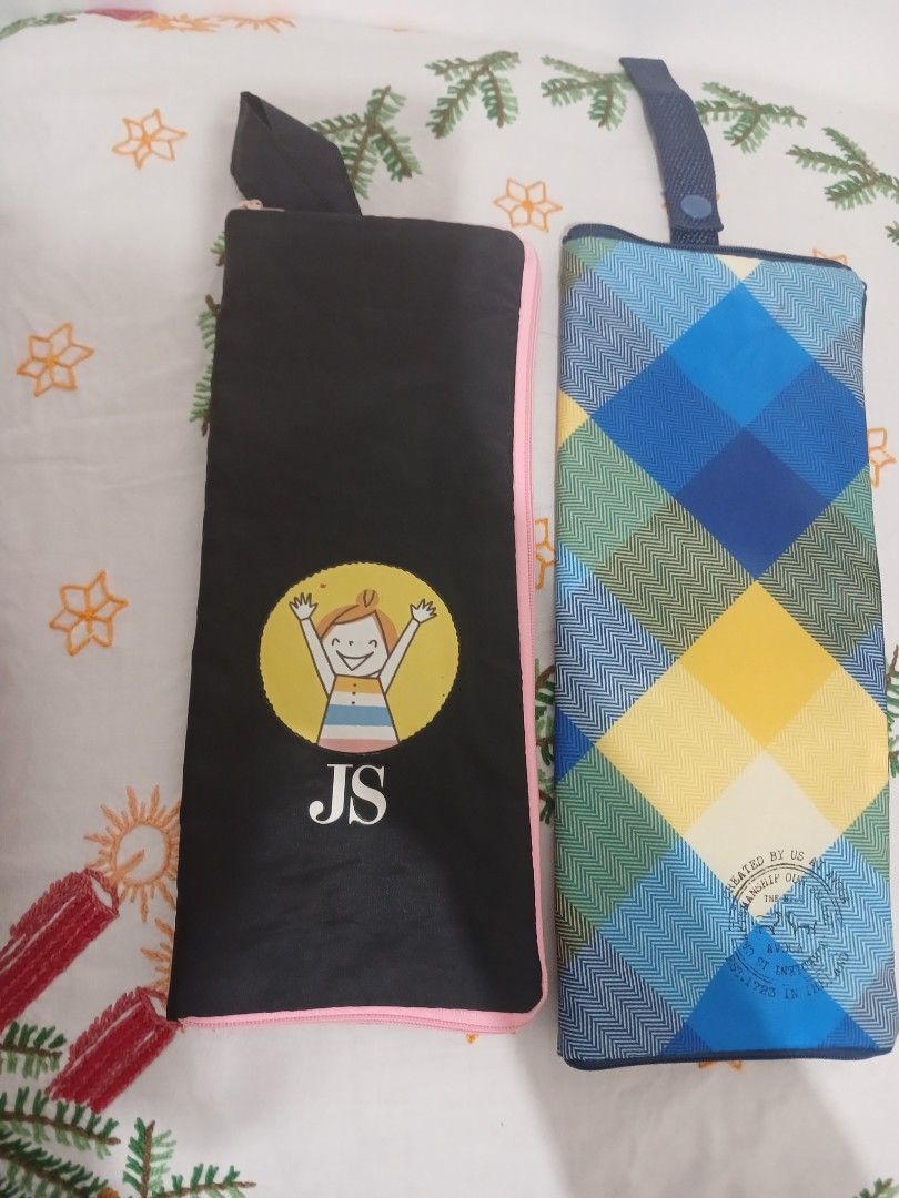 Umbrella/Water Bottle Pouch Bundle (Category: Purses & Pouches) located in Pasig City. Submitted by moreonwatches (Listing ID 1460198452, Image 1). Description: Bundle of two Water Bottle/Umbrella Absorbent Case Japan-Sourced Can fit tumbler and folding umbrella Waterproof.