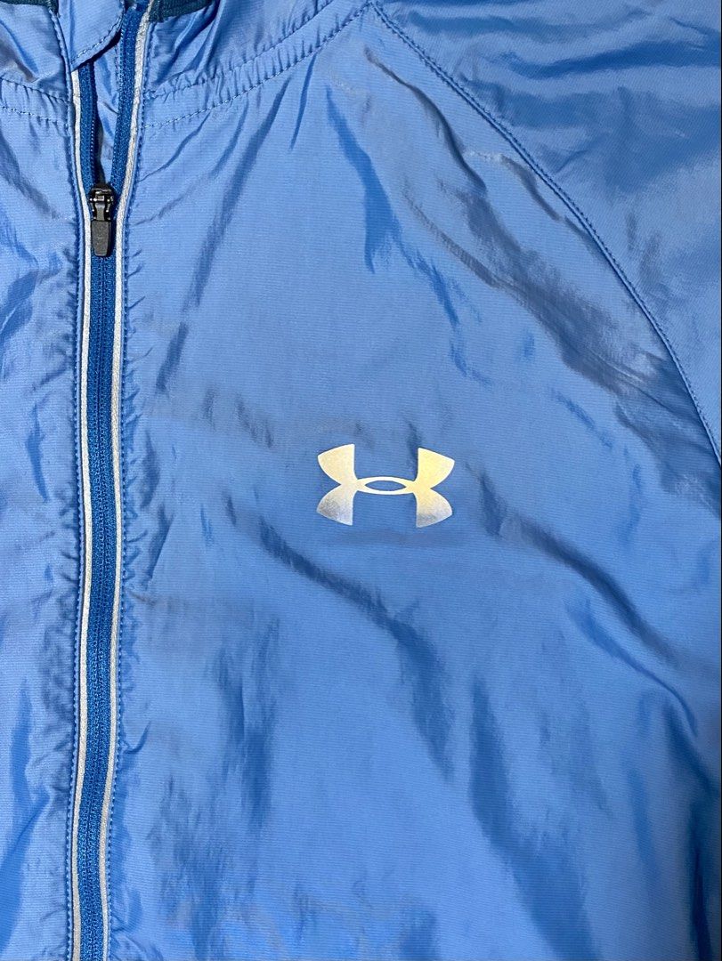 Under Armour Men's Fitted Running Jacket MD/M (Category: Coats, Jackets and Outerwear) located in Manila. Submitted by sebthrift (Listing ID 1460128240, Image 2). Description: - Under Armour Running Jacket - Color: Blue and Navy Color Block - Material: Lightweight and Breathable - Features: Full Zip Closure - Size: Medium - Ideal for: Workouts or Casual Wear.